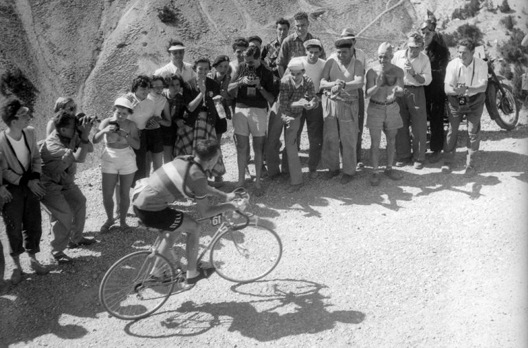 Fausto Coppi filming Tour de France from roadside while Louison Bonet climbing Col du Izoard