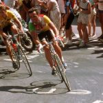 Greg LeMond and Bernard Hinault in one of the 21 hairpin bends of Alpe d'Huez at the Tour de France in 1986