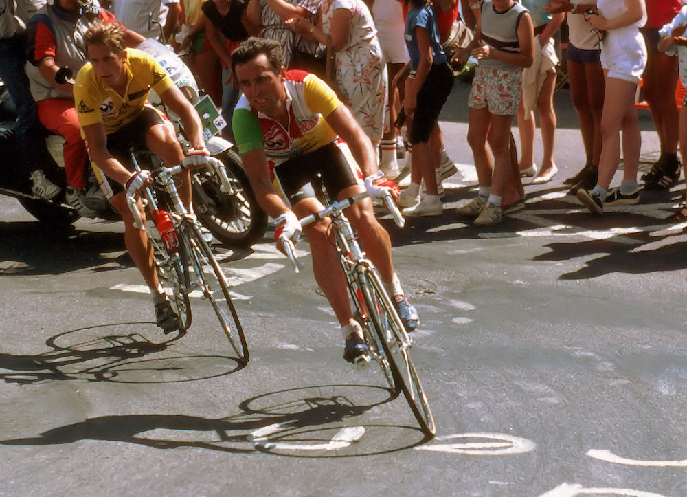 Greg LeMond and Bernard Hinault in one of the 21 hairpin bends of Alpe d'Huez at the Tour de France in 1986