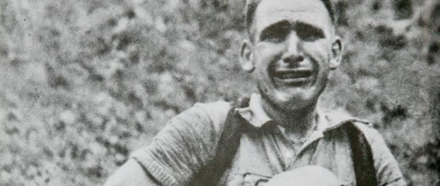 Inexperienced cyclist in yellow jersey rescued from the ravine (Wim van Est, Tour de France 1951)