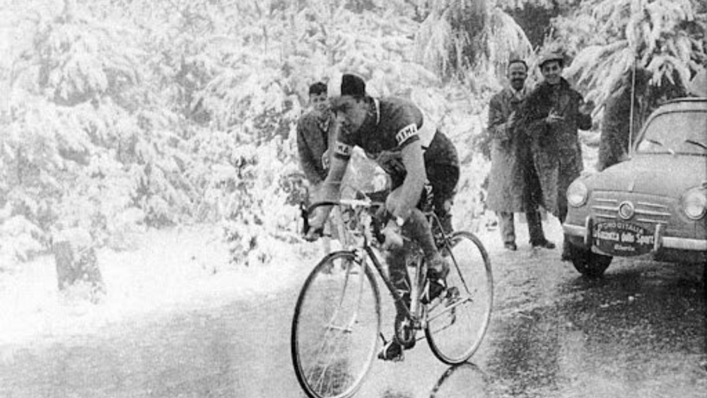 Charly Gaul on a snowy road during the famous Bondone stage of Giro d'Italia 1956