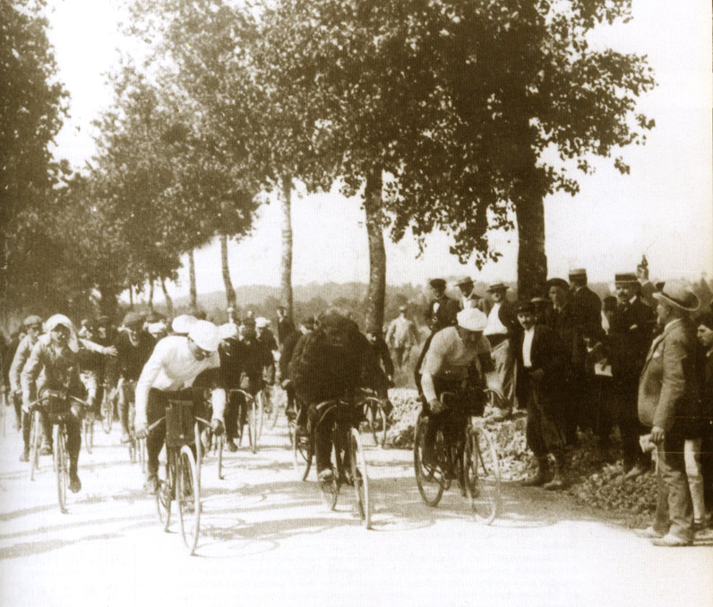 A bunch of cyclists riding together during the very first Tour de France stage on the 1st July 1903.