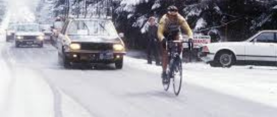 Bernard Hinault pedalling un the snow furing the infamous Liege Bastogne Liege monument on 20th April 1980