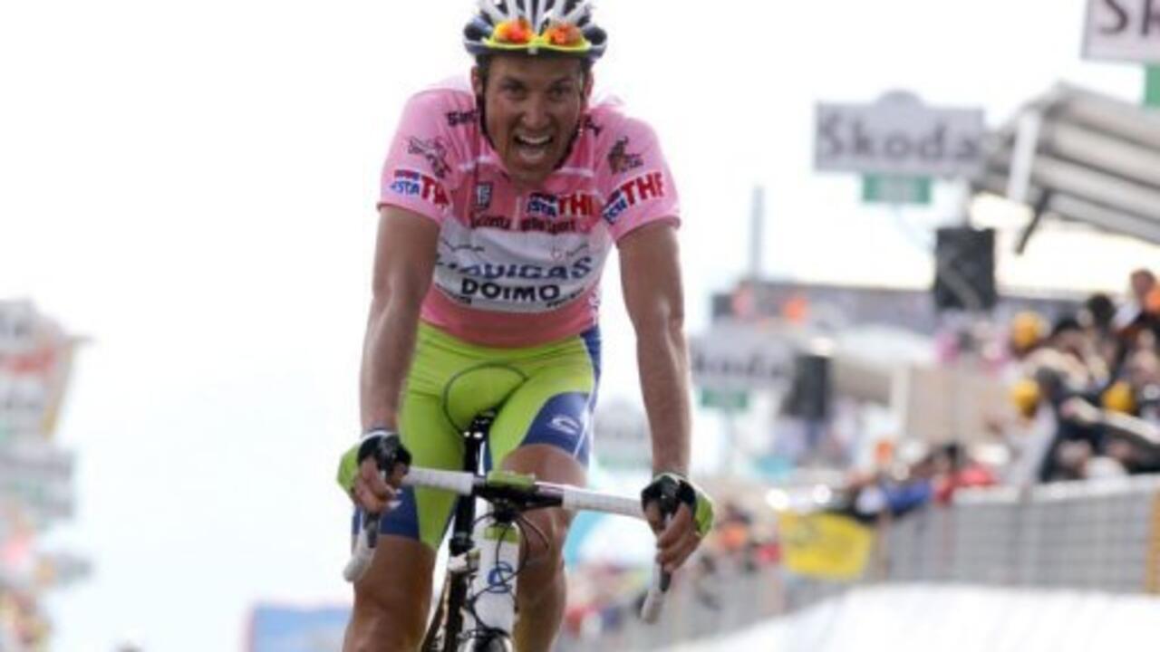 Ivan Basso in pink jereey arriving in the finish of a mountain stage Giro d'Italia 2010